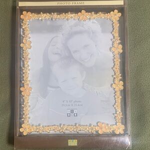 NWT MYX frame with orange flowers and rhinestones. Size is 8” x 10”.